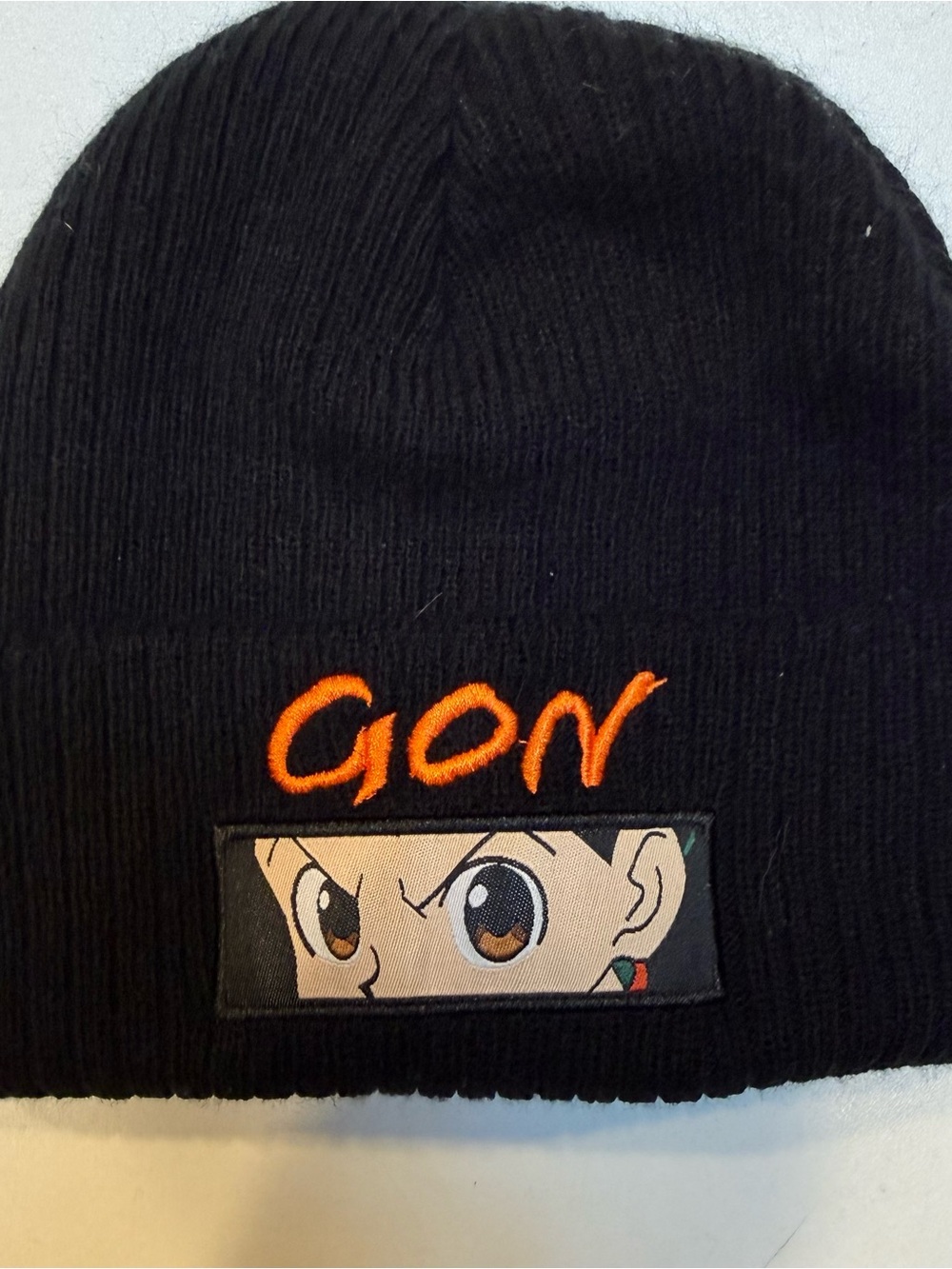 Hunter Black Beanie with Orange 'GON' Embroidery and Character Patch